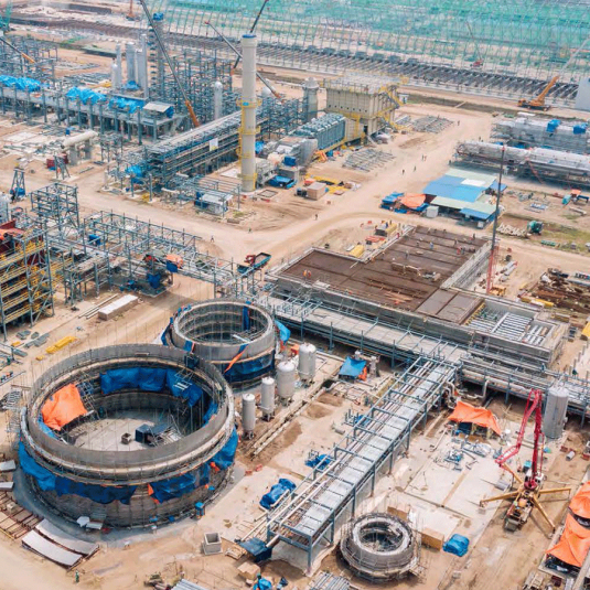 Materials Management: A massive construction site of an industrial facility - aerial view.